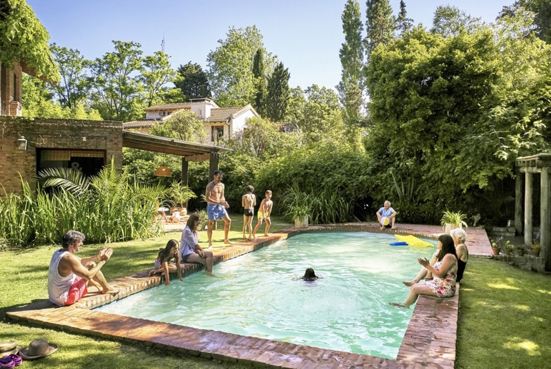 a group of people sitting at a park