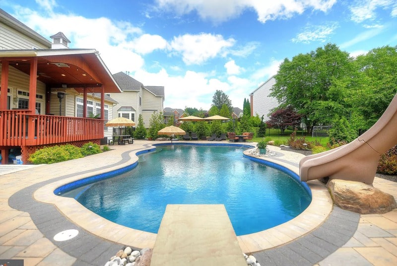 a small house in a pool of water