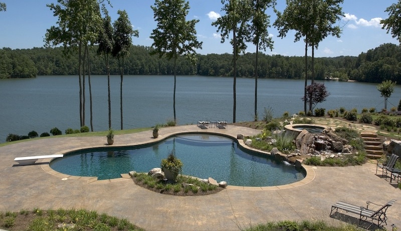 a pool next to a body of water