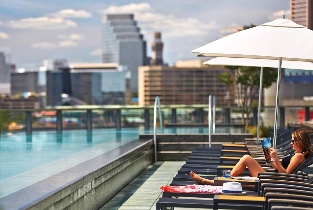a woman sitting on a bench