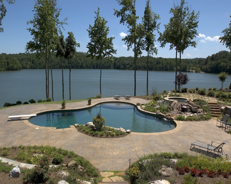 a pool next to a body of water