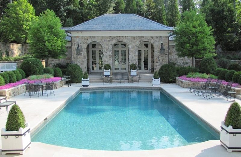a pool next to a building